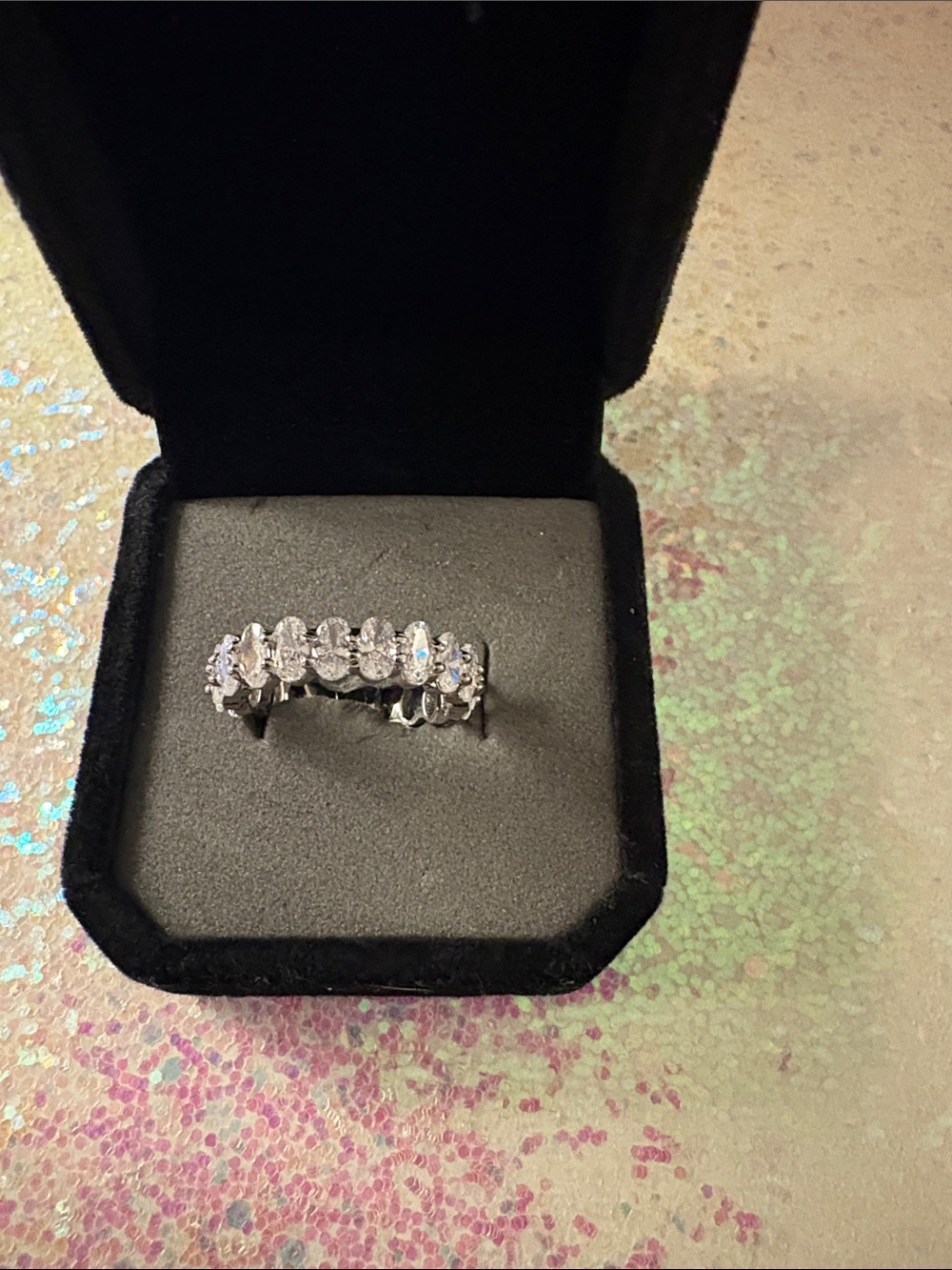 Classic Rhodium Cubic Zirconia Halo Eternity Band oval cut.